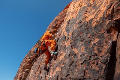 Rock climber dressed as a tiger on Halloween