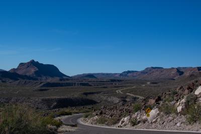 A view westbound up the winding road along the Rio Grande