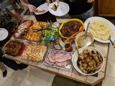 A Thanksgiving dinner buffet in a friend's kitchen